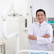 A Dentist Standing in his Clinic