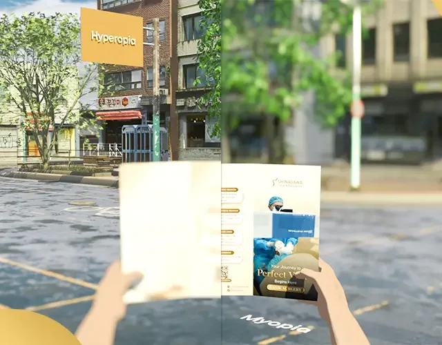View of a street appearing blurry on one side and clear on the other, showing the difference between hyperopia and myopia while someone holds an eye health brochure
