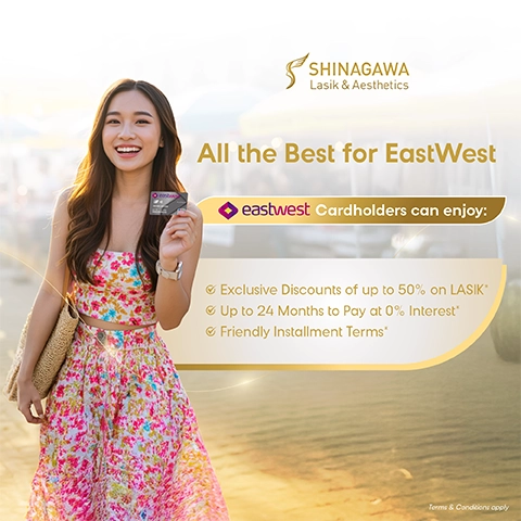 Smiling woman holding EastWest credit card promoting LASIK discounts at Shinagawa Lasik & Aesthetics in the Philippines