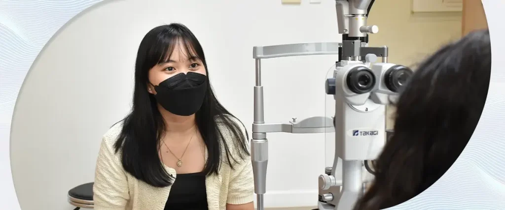 Patient undergoing eye examination with Takagi slit lamp at Shinagawa Lasik & Aesthetics in the Philippines