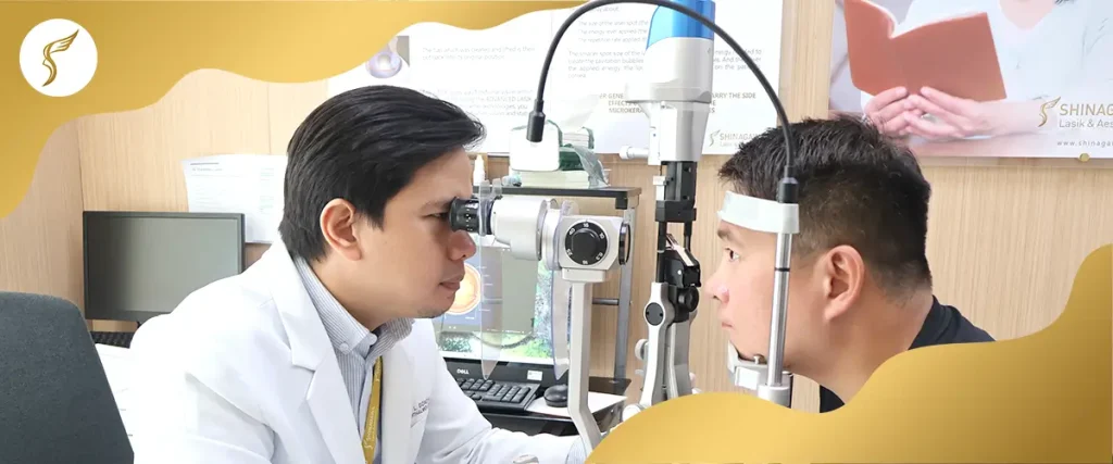 Eye doctor performing a detailed eye examination using a slit lamp during a vision screening at Shinagawa Lasik & Aesthetics.