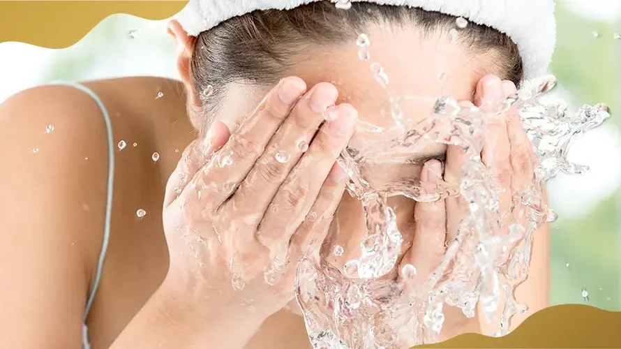 Woman washing her face with water as part of proper eye care and hygiene before and after eye treatments at Shinagawa Lasik & Aesthetics.